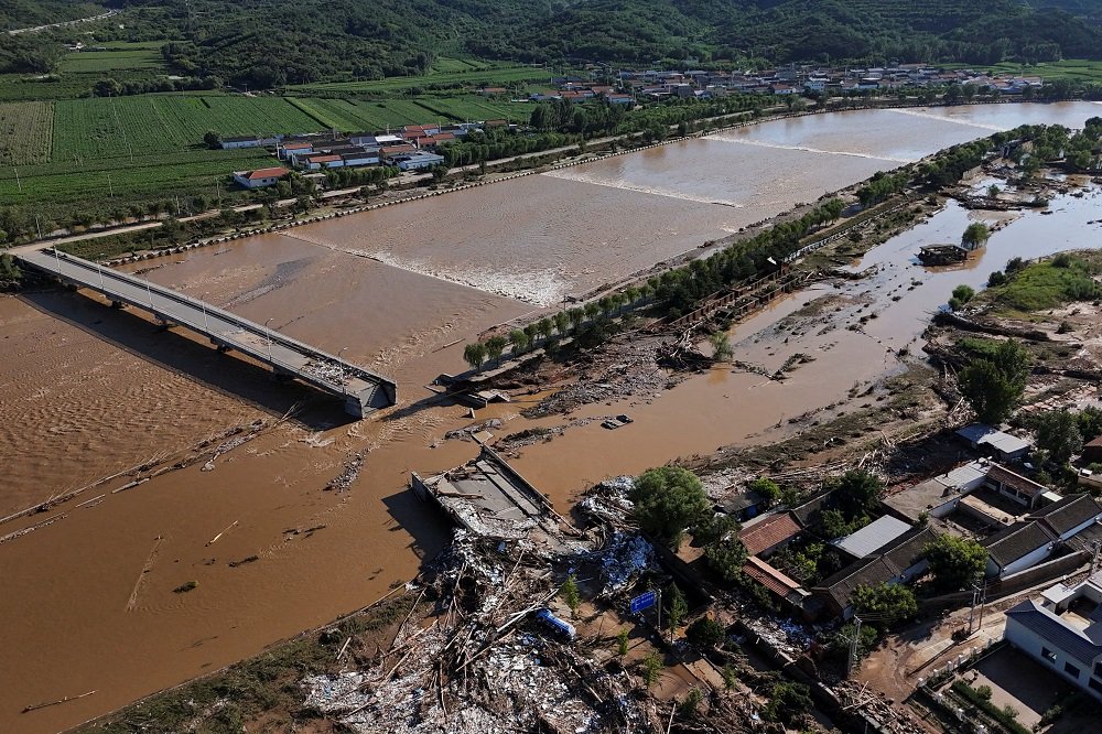 Beijing expands storm alert as fatal floods keep city on edge – SABC News